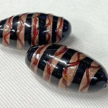 2 Vintage Black Metallic Red Striped Abstract Oval Glass Beads