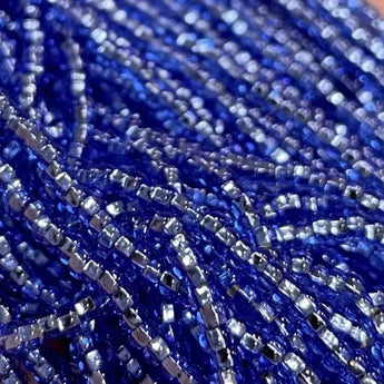 Blue sapphire light Czech silver lined glass seed beads, size 11/0.