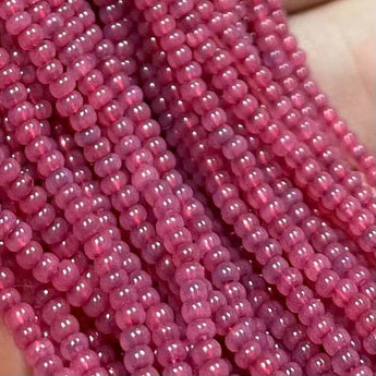 1 Hank Pink Fuchsia Opal Czech Glass Seed Beads, Size 11/0, close-up view.