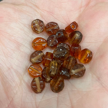 24 Vintage Mixed Pressed Topaz Glass Beads