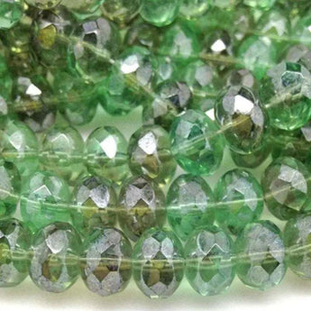 20 large light green Czech rondelle glass beads with faceted design.