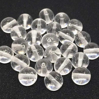 25 Clear Round Czech Glass Beads measuring 8mm on black background.