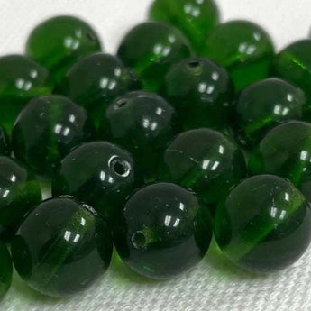 25 dark green Czech round glass beads, 10mm size.