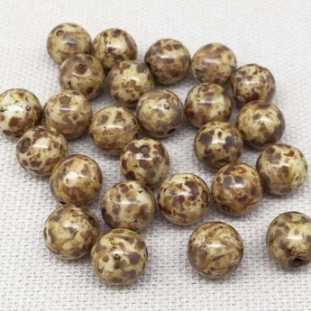 25 golden brown Picasso Czech round glass beads, 8mm in size.