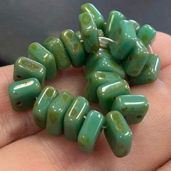 Green two-hole Chexx Czech Picasso glass beads, 6x3mm, set of 25.