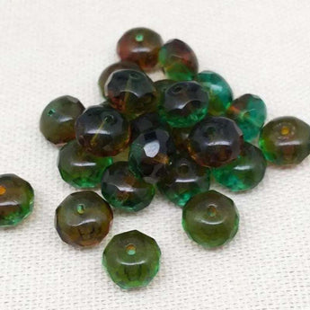 25 Topaz Green Czech faceted rondelle glass beads, 9x6mm, with green and golden topaz hues.