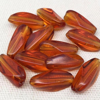 12 Topaz Oval Glass Beads