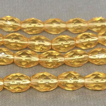 25 Golden Topaz Czech Faceted Oval Glass Beads