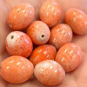 10 Vintage Mottled Orange Oval Glass Beads