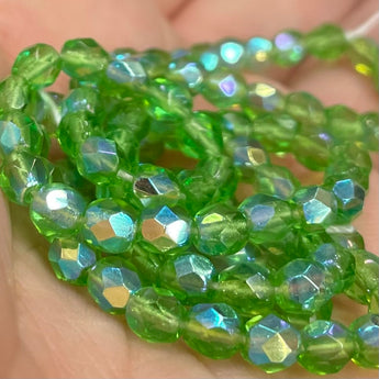 100 AB Light Green Fire Polished Glass Beads